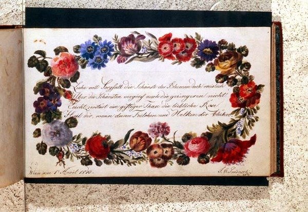 Frontispiz eines Gästebuchs, dekoriert mit einem Epigramm in deutscher Sprache, umgeben von einem Blumenkranz, datiert 1. April 1813 von Austrian School