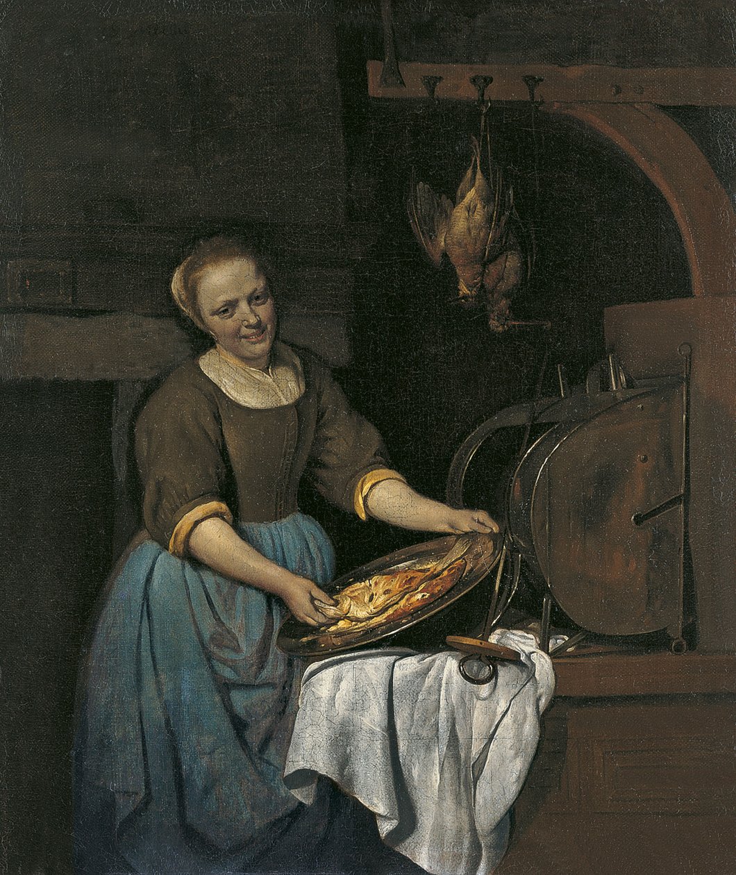 Küchenmagd bereitet Fisch zu von Gabriel Metsu