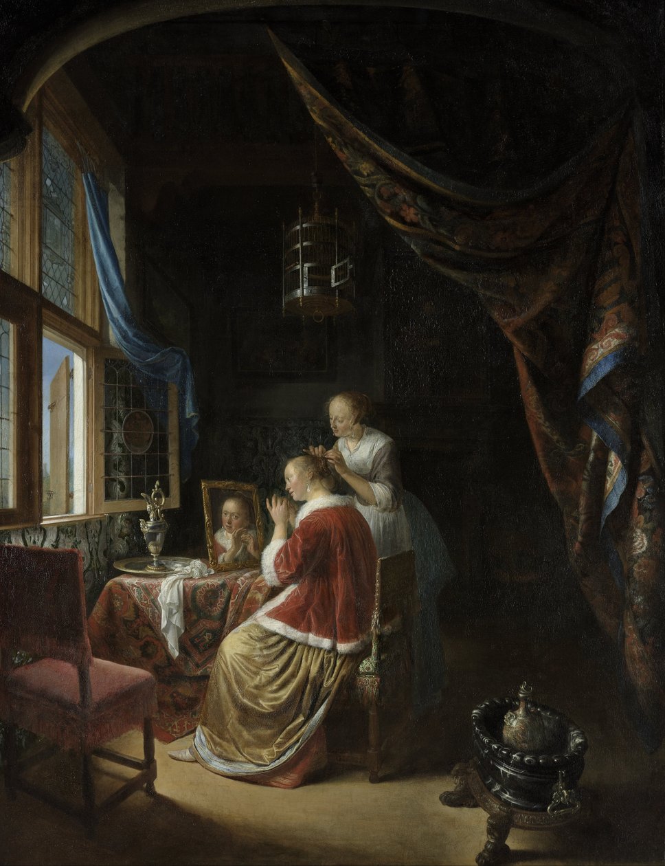 Junge Frau bei ihrer Toilette von Gerrit Dou