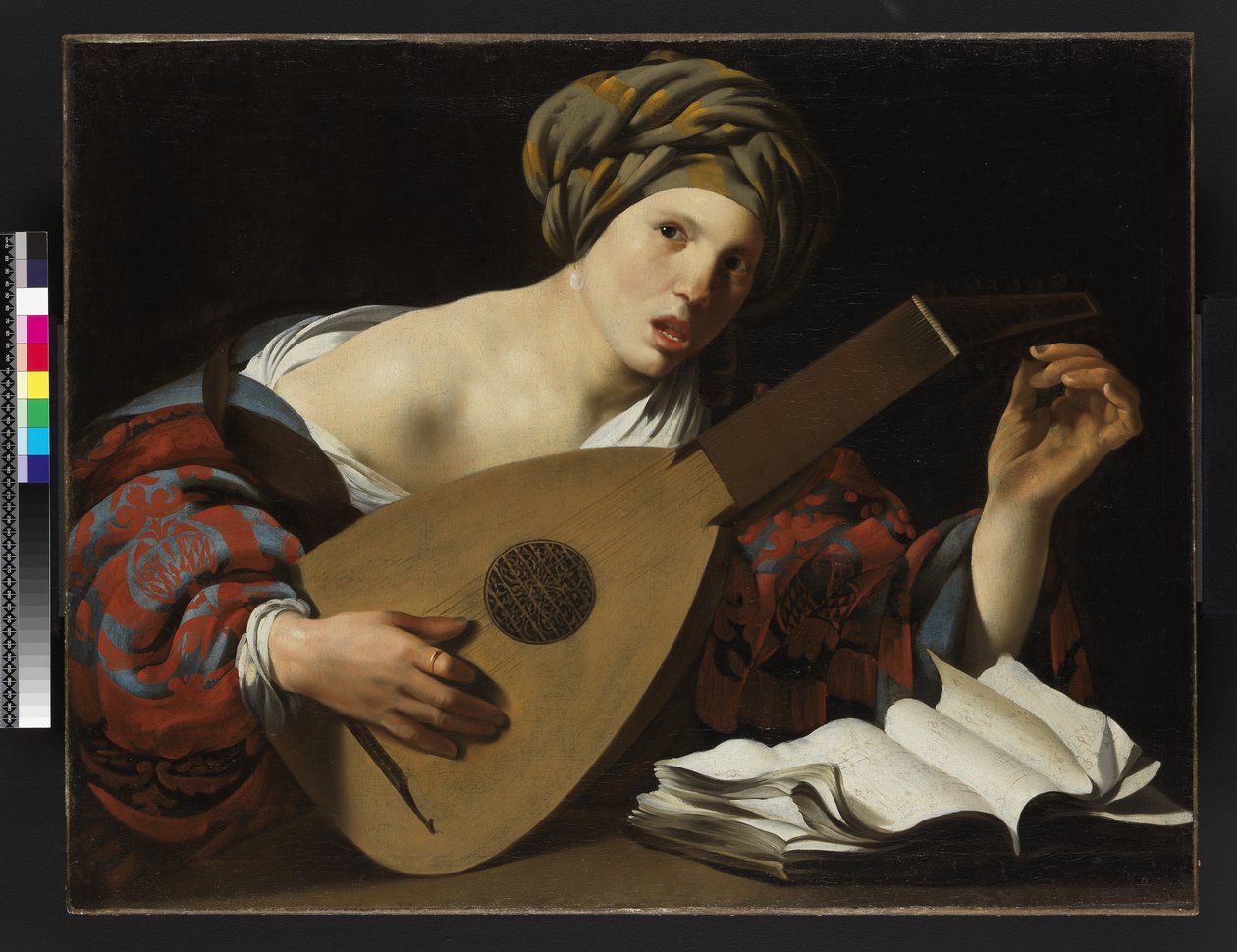 Junge Frau, die eine Laute stimmt, ca. 1626-27 von Hendrick ter Brugghen