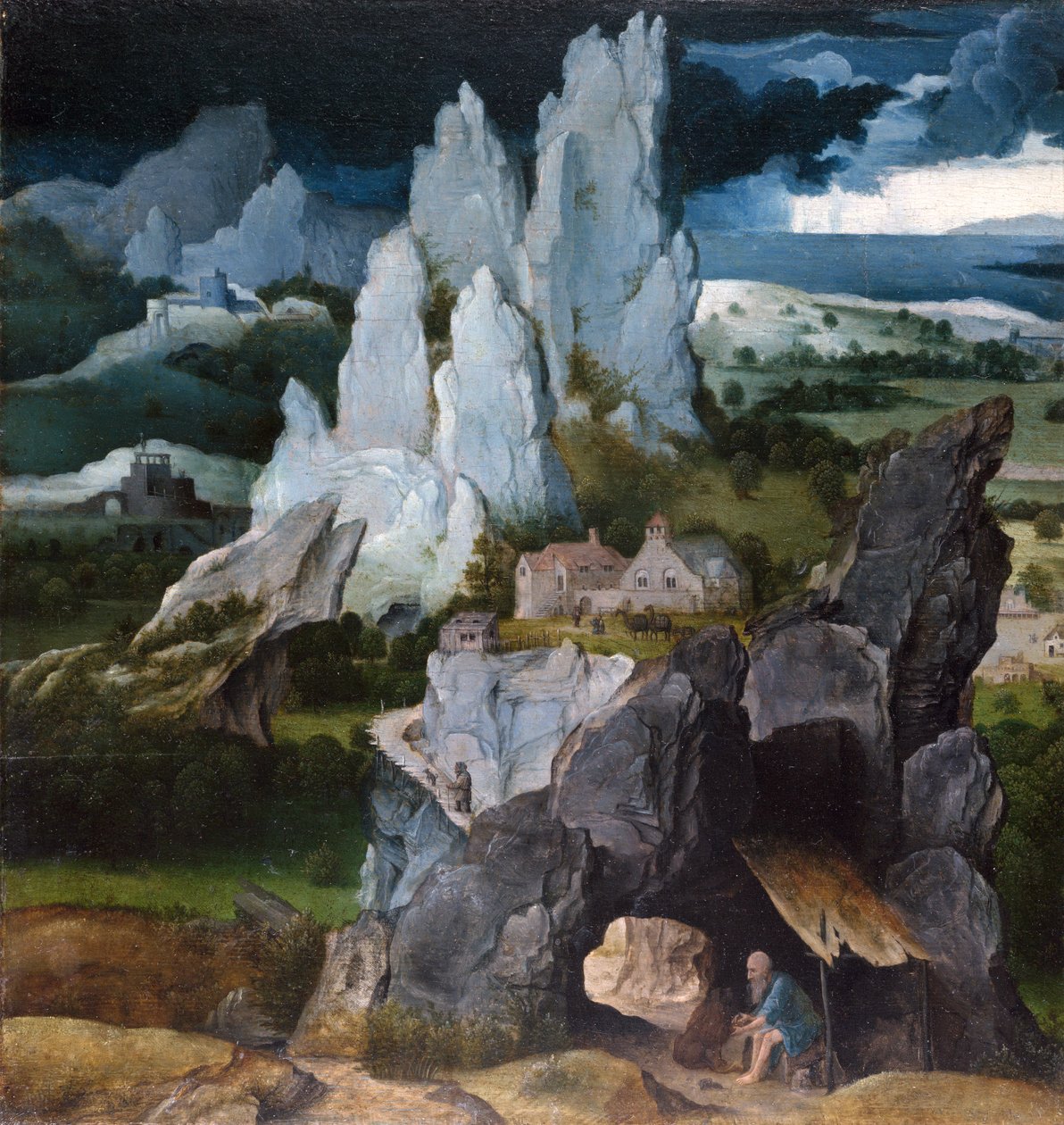 St. Hieronymus in einer felsigen Landschaft von Joachim Patenier
