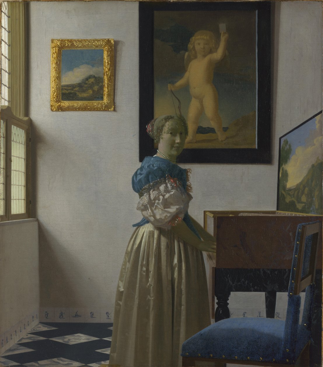 Eine junge Frau an einem Virginal von Johannes Vermeer
