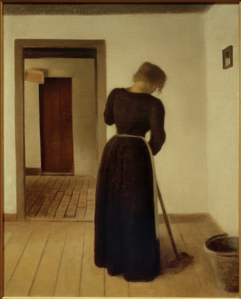 Interieur mit einer jungen Frau beim Fegen von Vilhelm Hammershoi