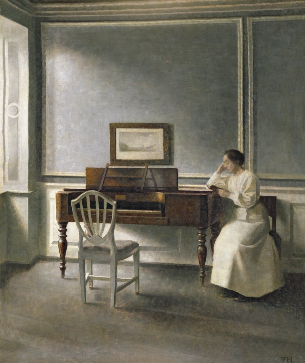 Frau liest am Klavier, 1907 von Vilhelm Hammershoi