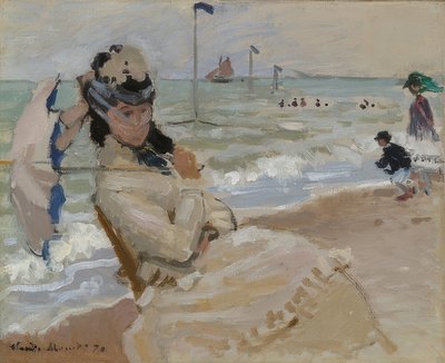 Camille am Strand von Trouville von Claude Monet
