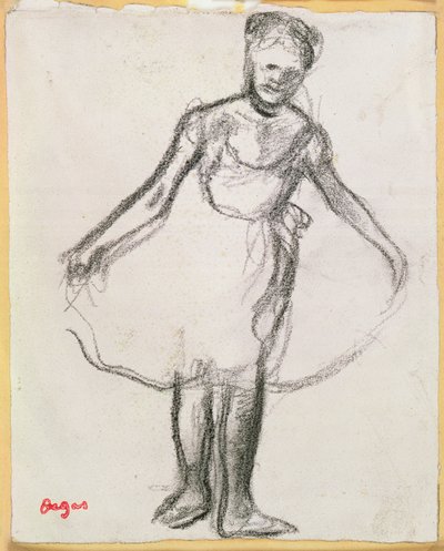 Stehende Tänzerin, die ein Tutu hält von Edgar Degas
