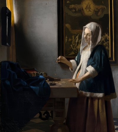 Frau mit Waage von Jan Vermeer van Delft