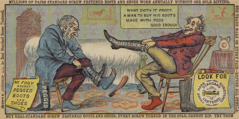 Alte Männer probieren Stiefel an von American School